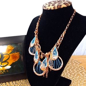 Beautiful Rose gold and blue guess statement necklace